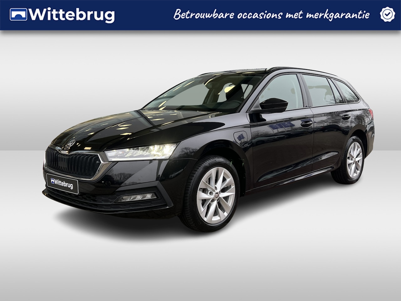 Skoda Octavia Combi - 1.4 TSI iV 204pk DSG PHEV Ambition / Parkeersensoren achter / Stoel + Stuur verwarming / C - AutoWereld.nl