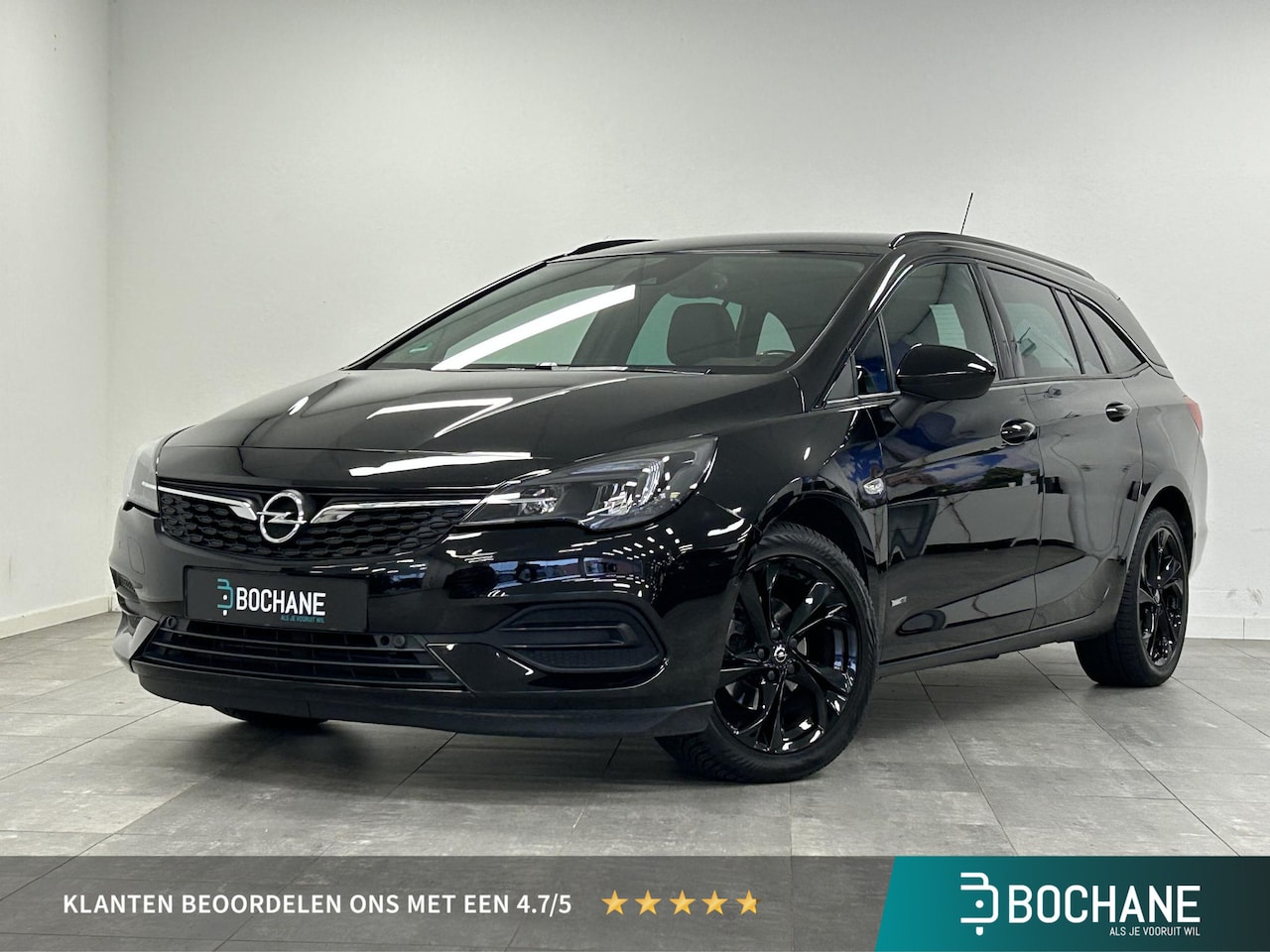 Opel Astra Sports Tourer - 1.2 Design & Tech NAVI | LED | TREKHAAK | WINTERPAKKET | AGR STOEL - AutoWereld.nl