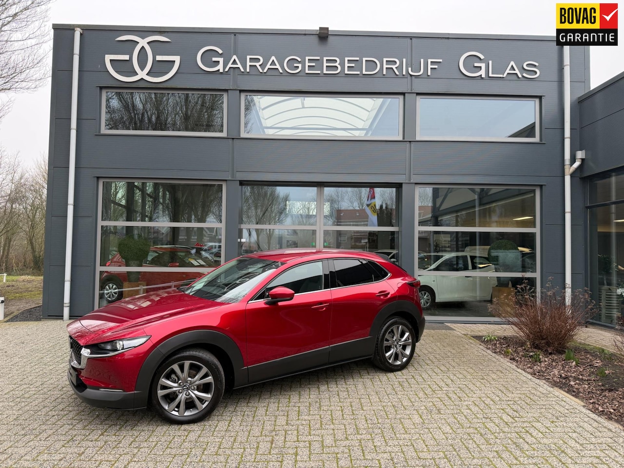 Mazda CX-30 - 2.0 e-SkyActiv-G M Hybrid stoel-stuurverw. head up display - AutoWereld.nl