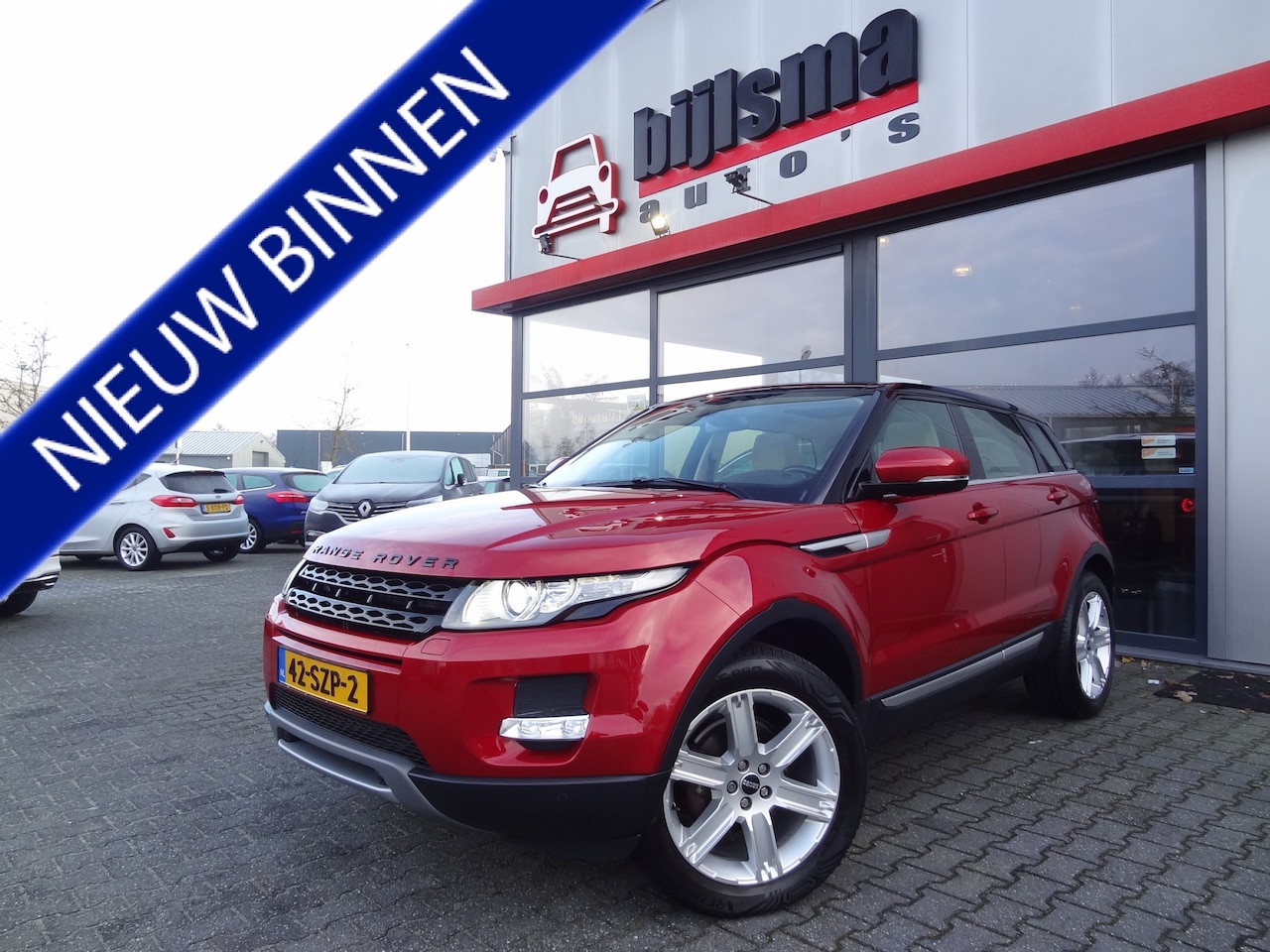 Land Rover Range Rover Evoque - 2.0 Si 4WD | NL-AUTO | MERIDIAN | PANO | CAMERA | TREKHAAK | NL-AUTO | CRUISE | - AutoWereld.nl