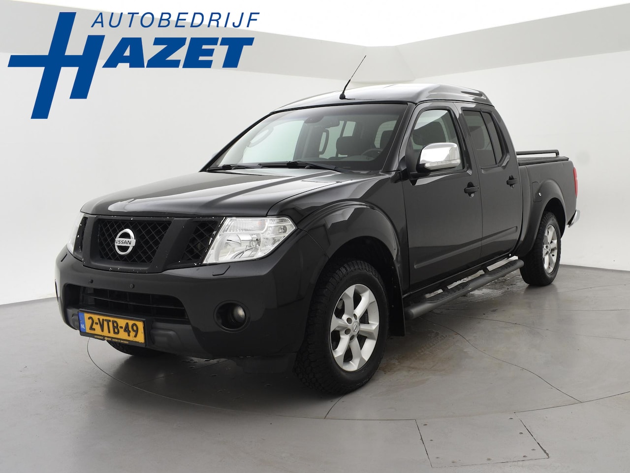 Nissan Navara - 2.5 DCI 190 PK AUT. 4X4 5-PERSOONS DOUBLE CAB + 3000 KG TREKHAAK | CAMERA | STOELVERWARMIN - AutoWereld.nl