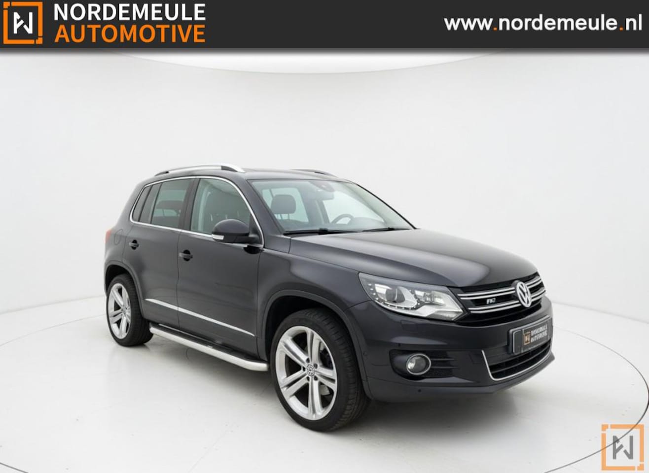 Volkswagen Tiguan - 2.0 TSI SPORTenST.4M R Line, Pano, DynAudio, Leder - AutoWereld.nl