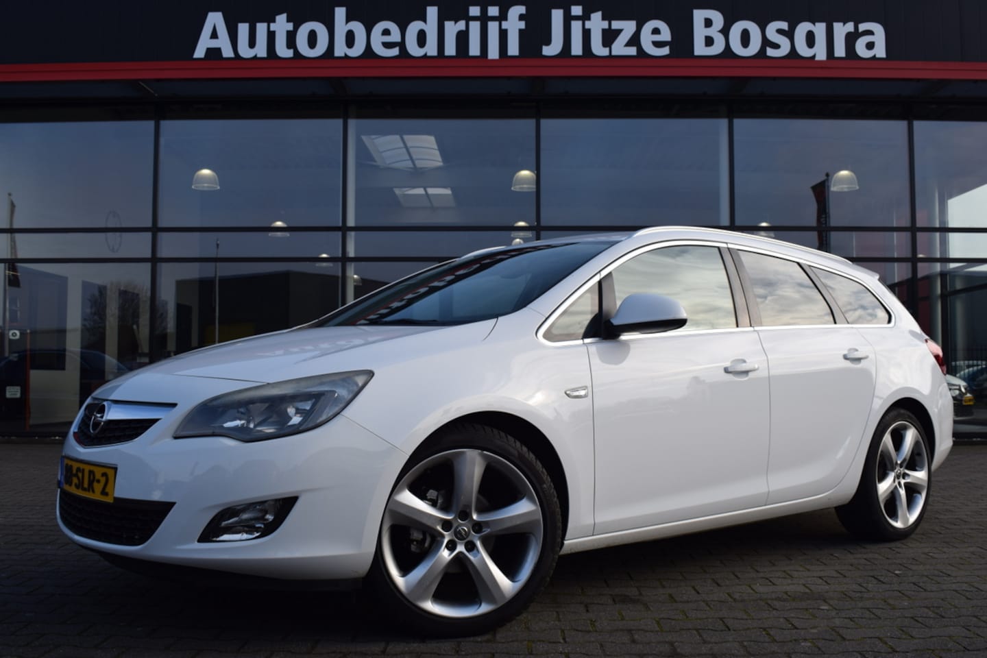 Opel Astra Sports Tourer - 1.4 Turbo 140pk Sport ECC | Full Map Navi | Telefonie | Sportstoelen | Trekhaak - AutoWereld.nl
