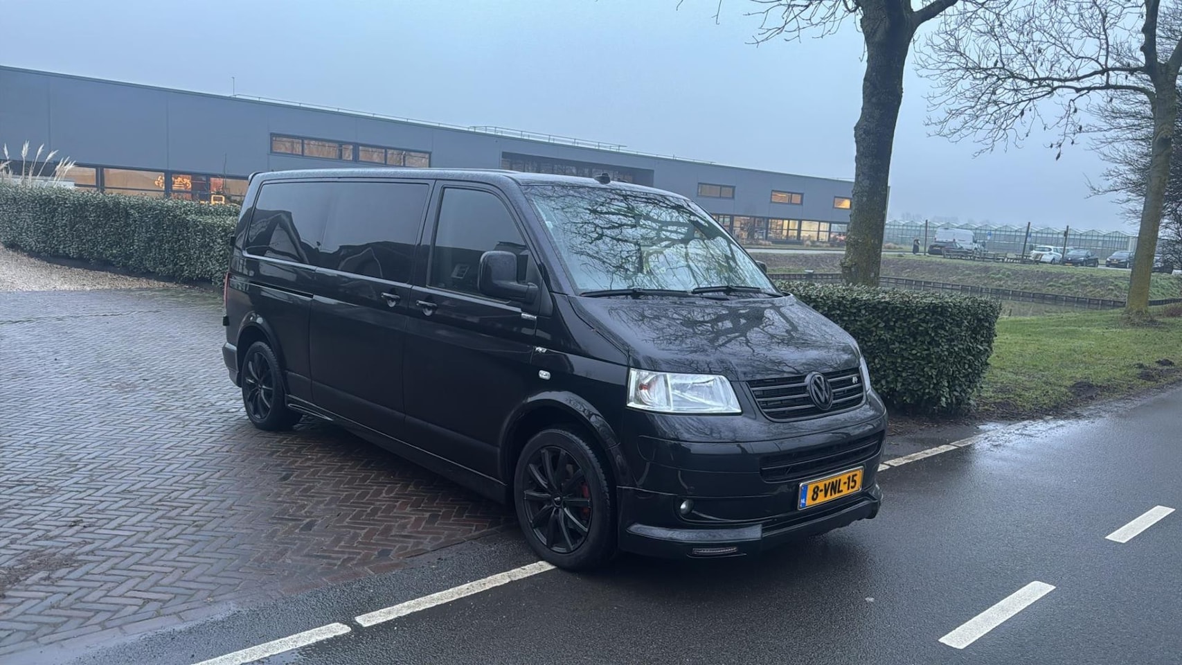 Volkswagen Transporter Caravelle - 2.5 TDI KANON BOMVOL AUTOMAAT CLIMA ZWART 2006 - AutoWereld.nl