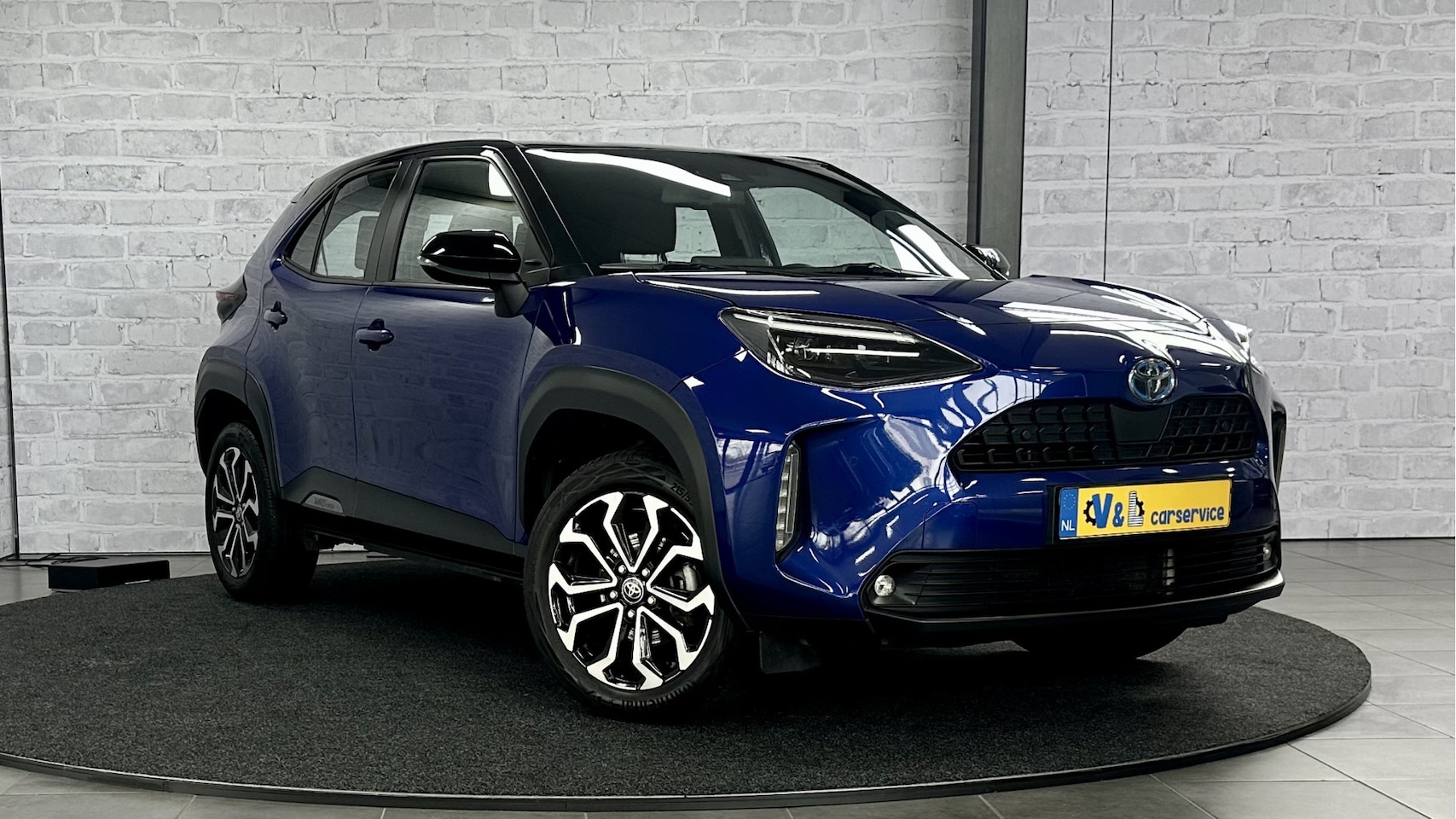 Toyota Yaris Cross - 1.5 Hybrid First Edition / Stoel/stuurverwar. / Carplay / Keyless - AutoWereld.nl