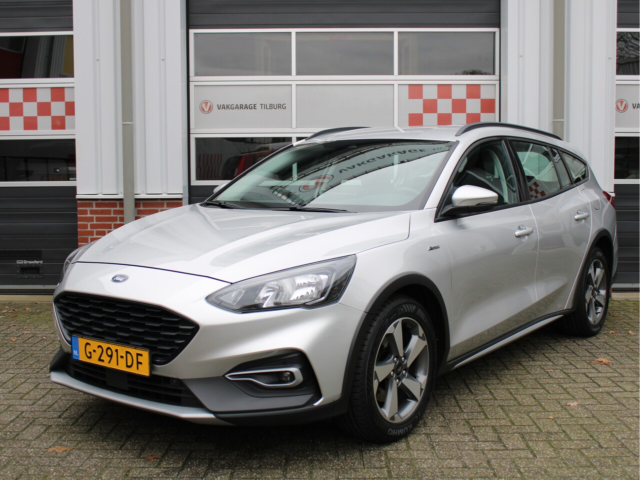 Ford Focus Wagon - 1.0 EcoBoost 125pk Active Business Dealer onderh./Airco/Cruise/Elek.Trekh./Navi/PDC/AppleC - AutoWereld.nl