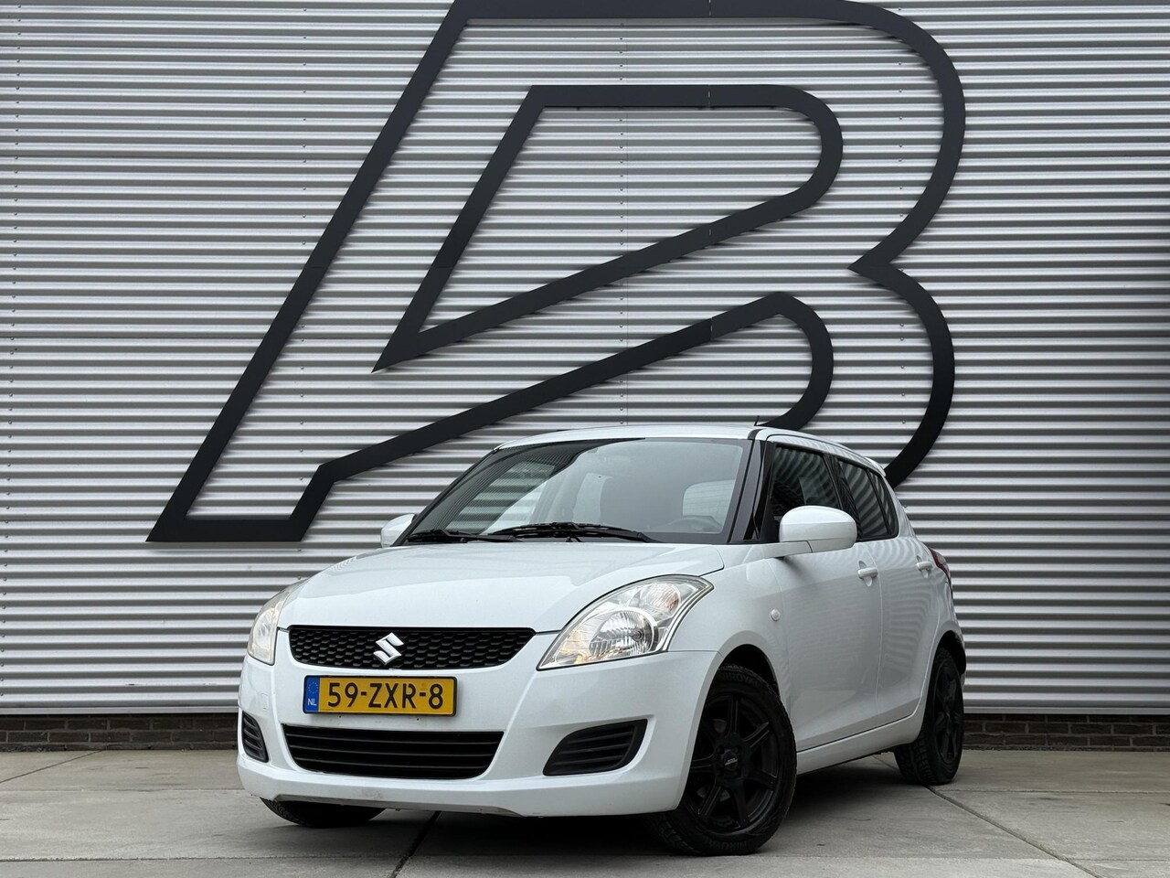 Suzuki Swift - 1.2 Bandit 1e Eigenaar|Airco|Cruise|PDC|LM Velgen|N.A.P|Nieuwe APK bij Aflevering - AutoWereld.nl