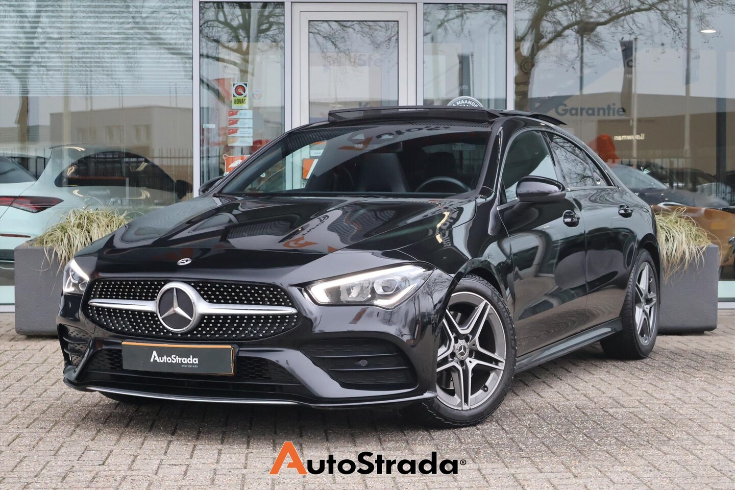 Mercedes-Benz CLA-Klasse - Coupé 200 AMG-Line 163pk | Camera | Pano | Cruise | Climate | Stoelverwarming | Sfeer | - AutoWereld.nl