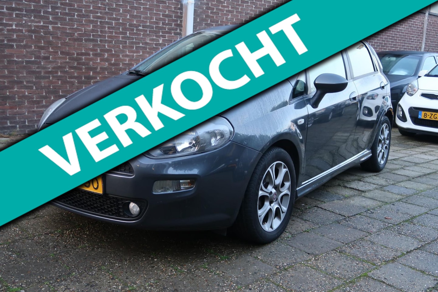 Fiat Punto Evo - 1.3 M-Jet Lounge 1.3 M-Jet Lounge - AutoWereld.nl