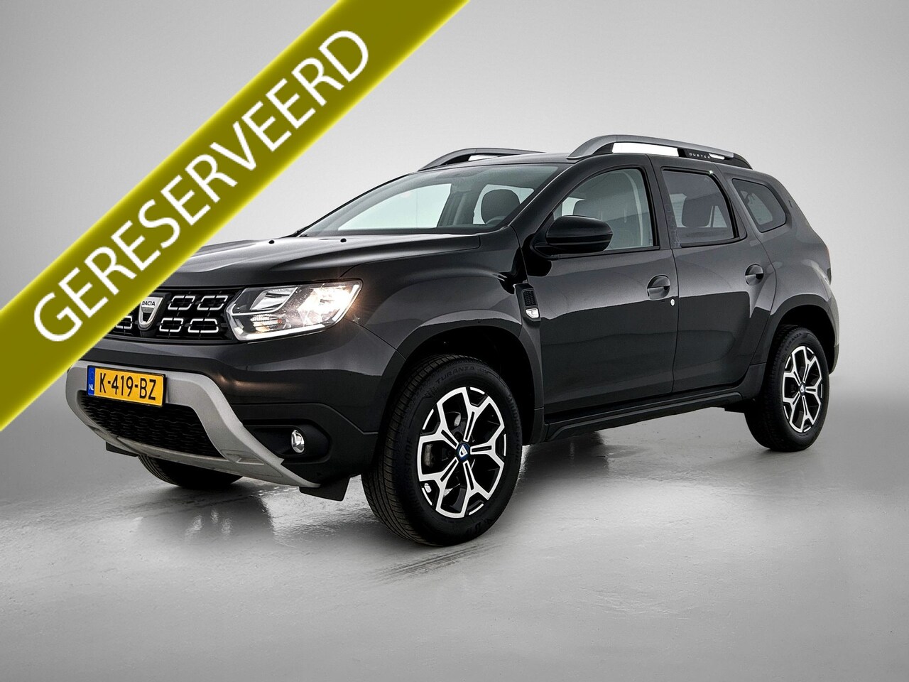 Dacia Duster - 1.3 TCe 150PK Serie Limitee 15th Anniversary / Pdc+Camera / Airco-ecc./ Radio multimedia / - AutoWereld.nl