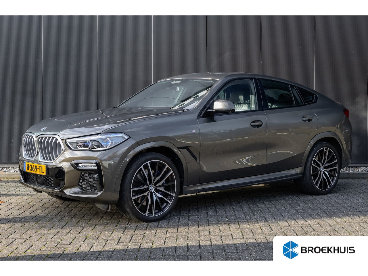 BMW X6 - xDrive40i High Executive HUD | H&K | Pano | Luchtvering | 360 Camera | Stuurverwarming | M - AutoWereld.nl