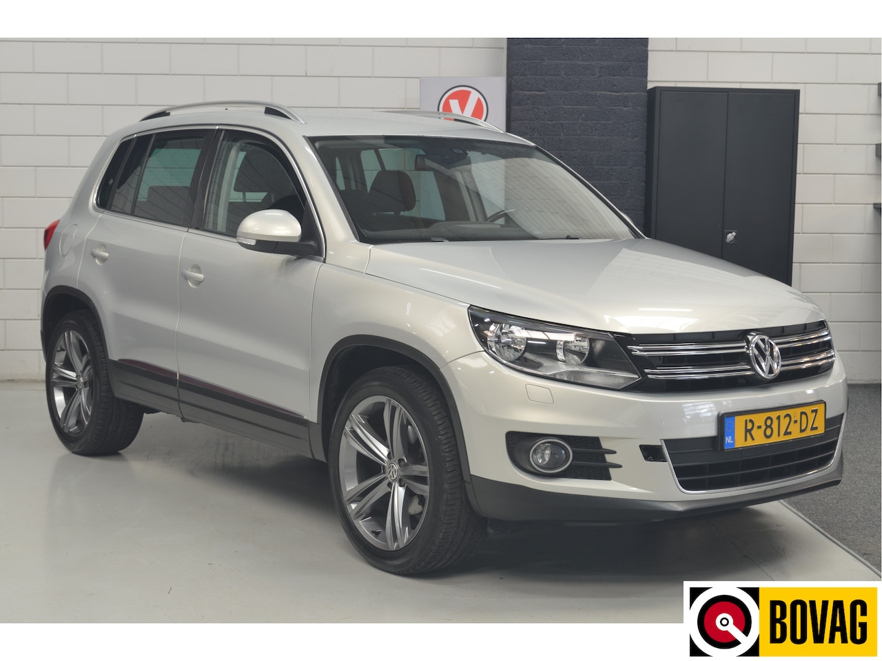 Volkswagen Tiguan - 1.4 TSI Sport&Style // 159.000 km // AIRCO // EL.TREKHAAK // STOELVERWARMING //PDC // - AutoWereld.nl