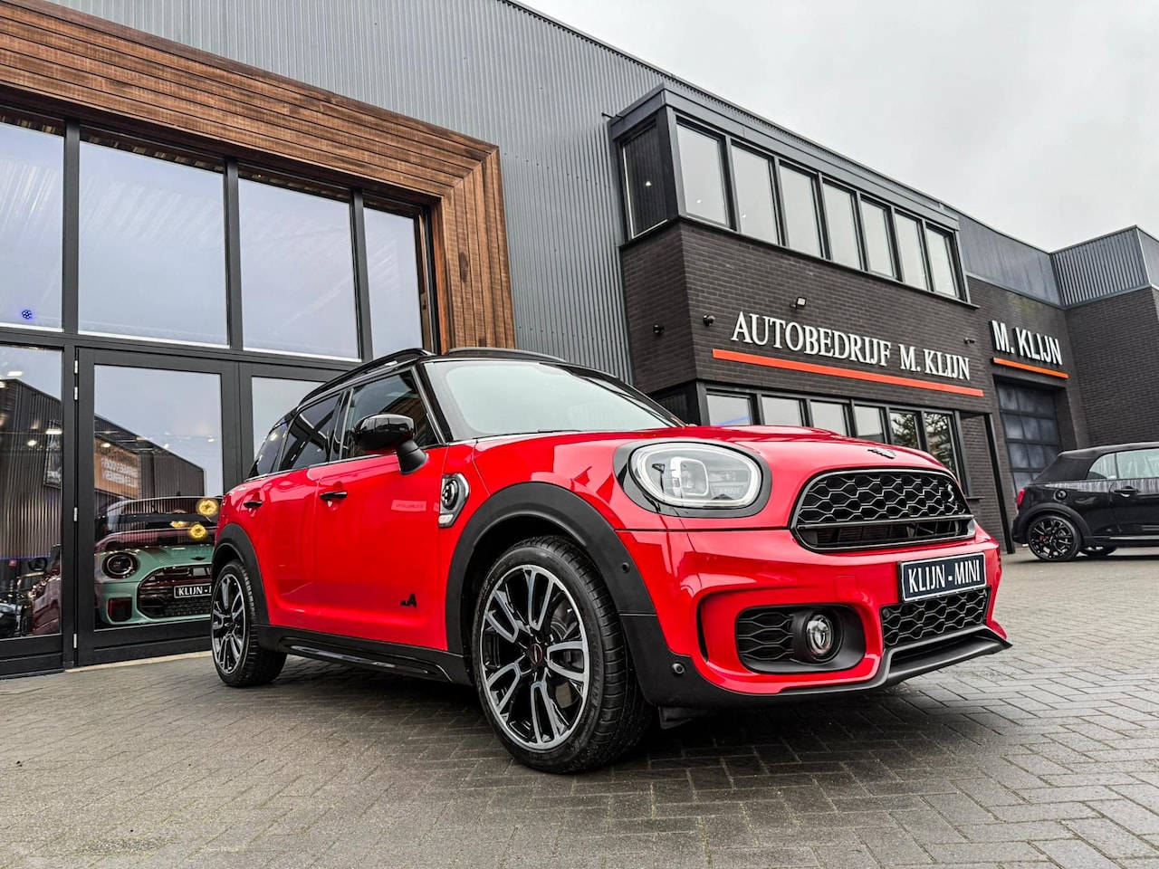 MINI Countryman - Mini Cooper S E ALL4 John Cooper Works 220pk/Pano/Leer/Memory/Camera/Btw - AutoWereld.nl