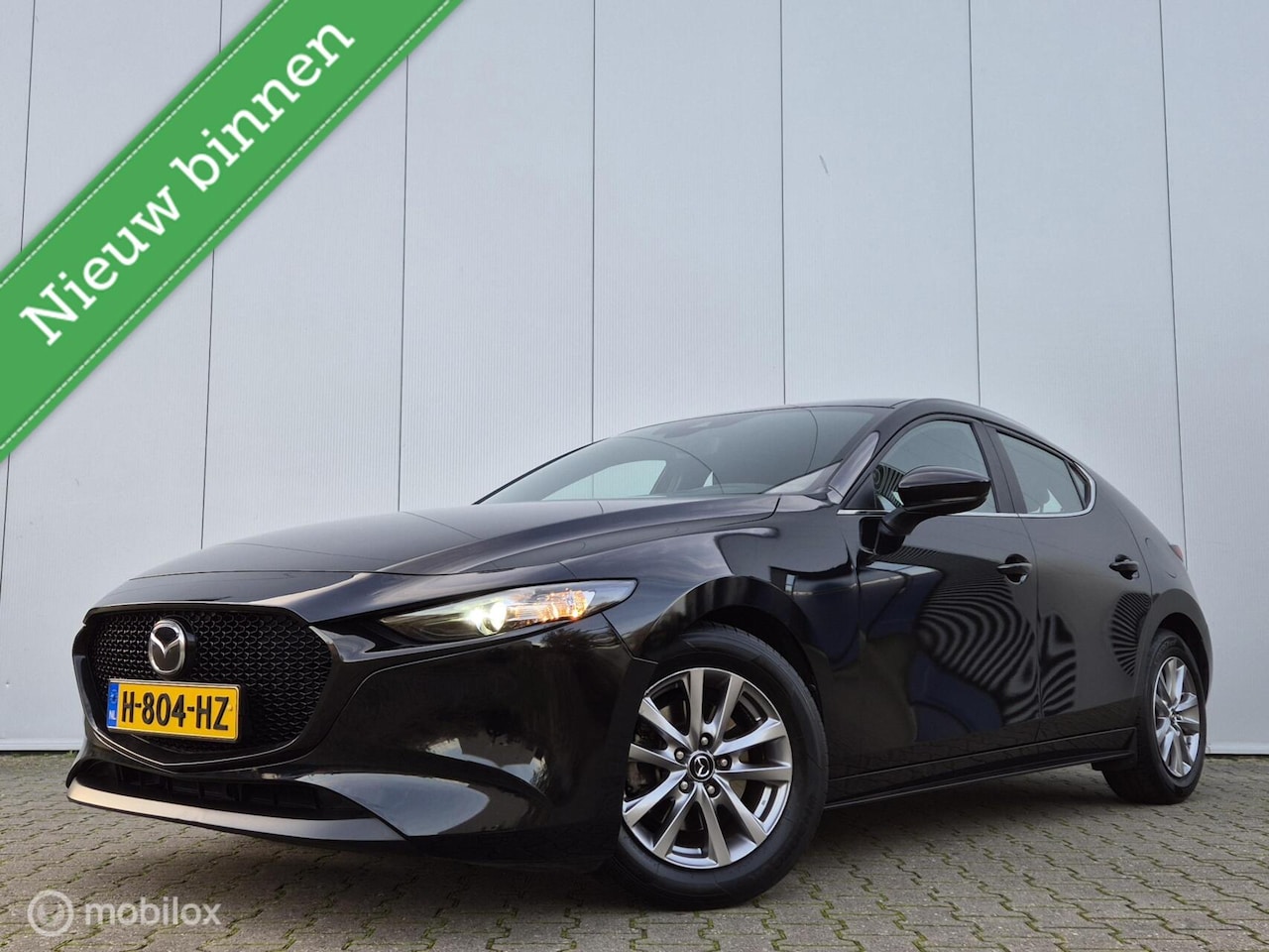 Mazda 3 - 2.0 E-SKYACTIV-G M HYBRID 122 AUTOMAAT/LED/HEAD-UP/STOELVERWARMING/KEYLESS - AutoWereld.nl