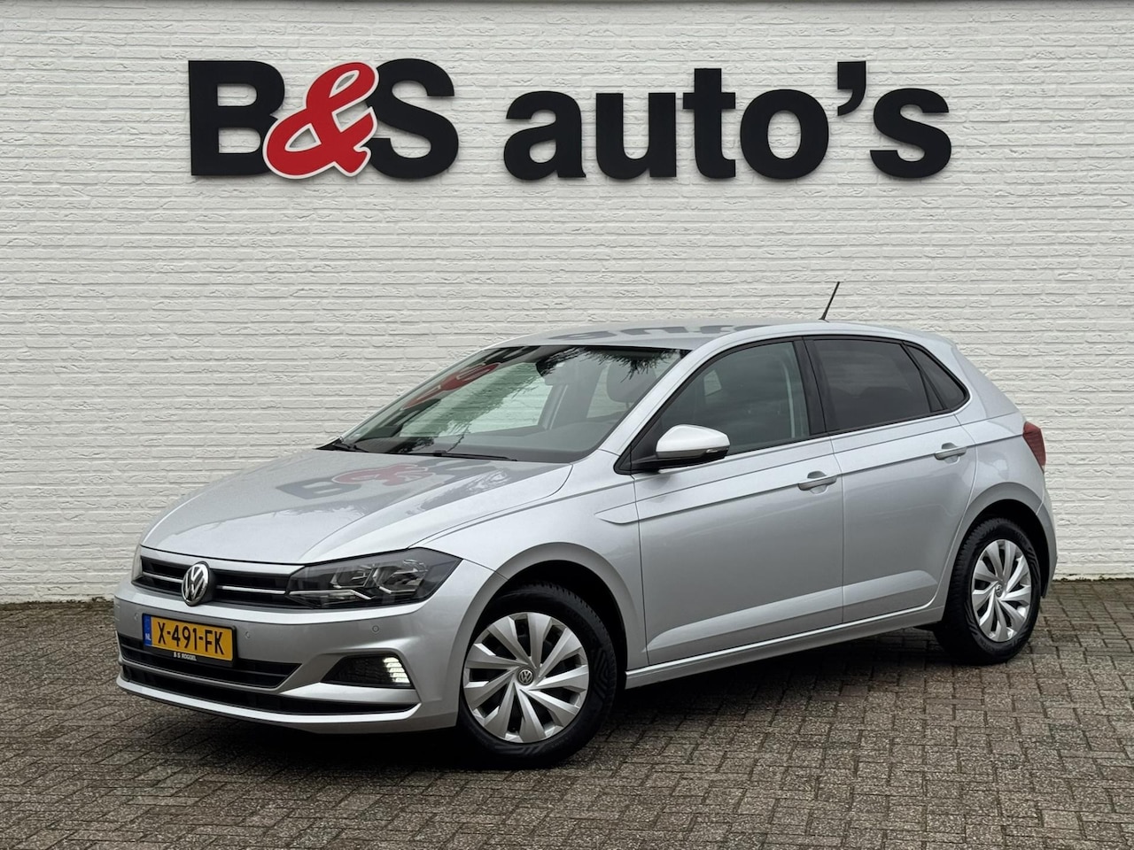 Volkswagen Polo - 1.0 TSI Comfortline Cruise control Climate control Parkeersensoren voor/achter Stoelverwar - AutoWereld.nl