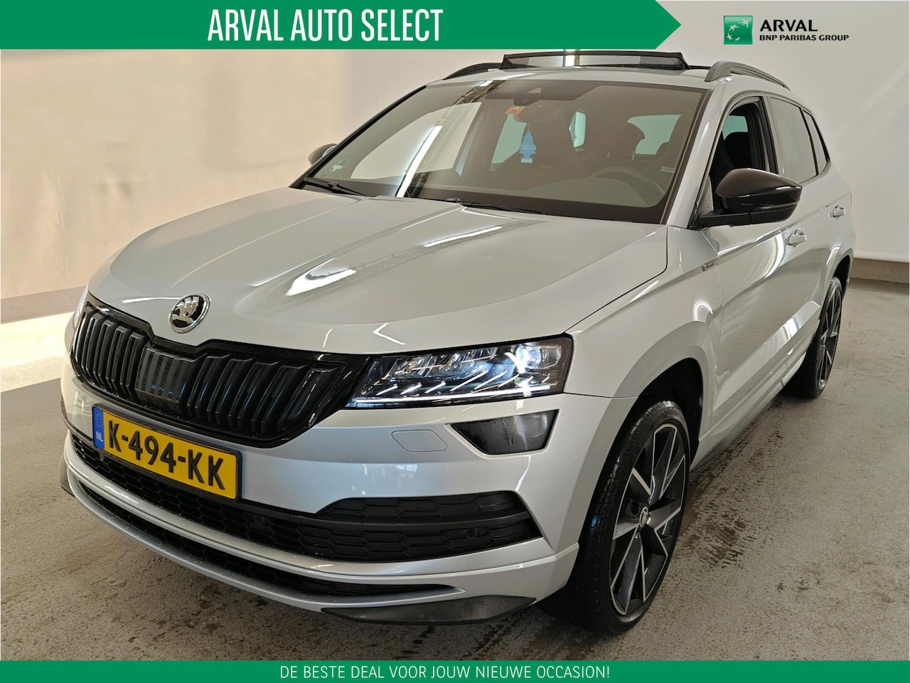 Skoda Karoq - 1.5 TSI 150pk Automaat Sportline Business | Panoramadak | Trekhaak | Comfortpakket | Stoel - AutoWereld.nl