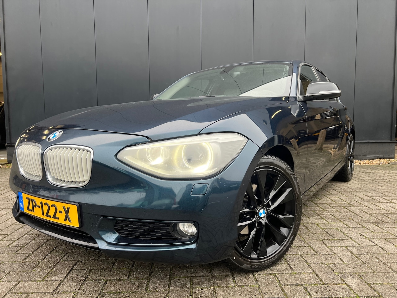 BMW 1-serie - 116i Sport '12 Aut/Leer/Navi/CarPlay/ZrMooi - AutoWereld.nl