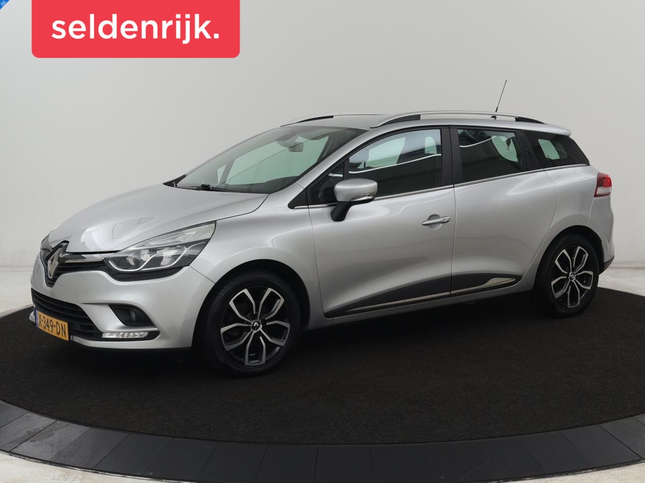 Renault Clio - 0.9 TCe Limited | Half leder | Climate control | Navigatie | Keyless | Cruise control | Bl - AutoWereld.nl