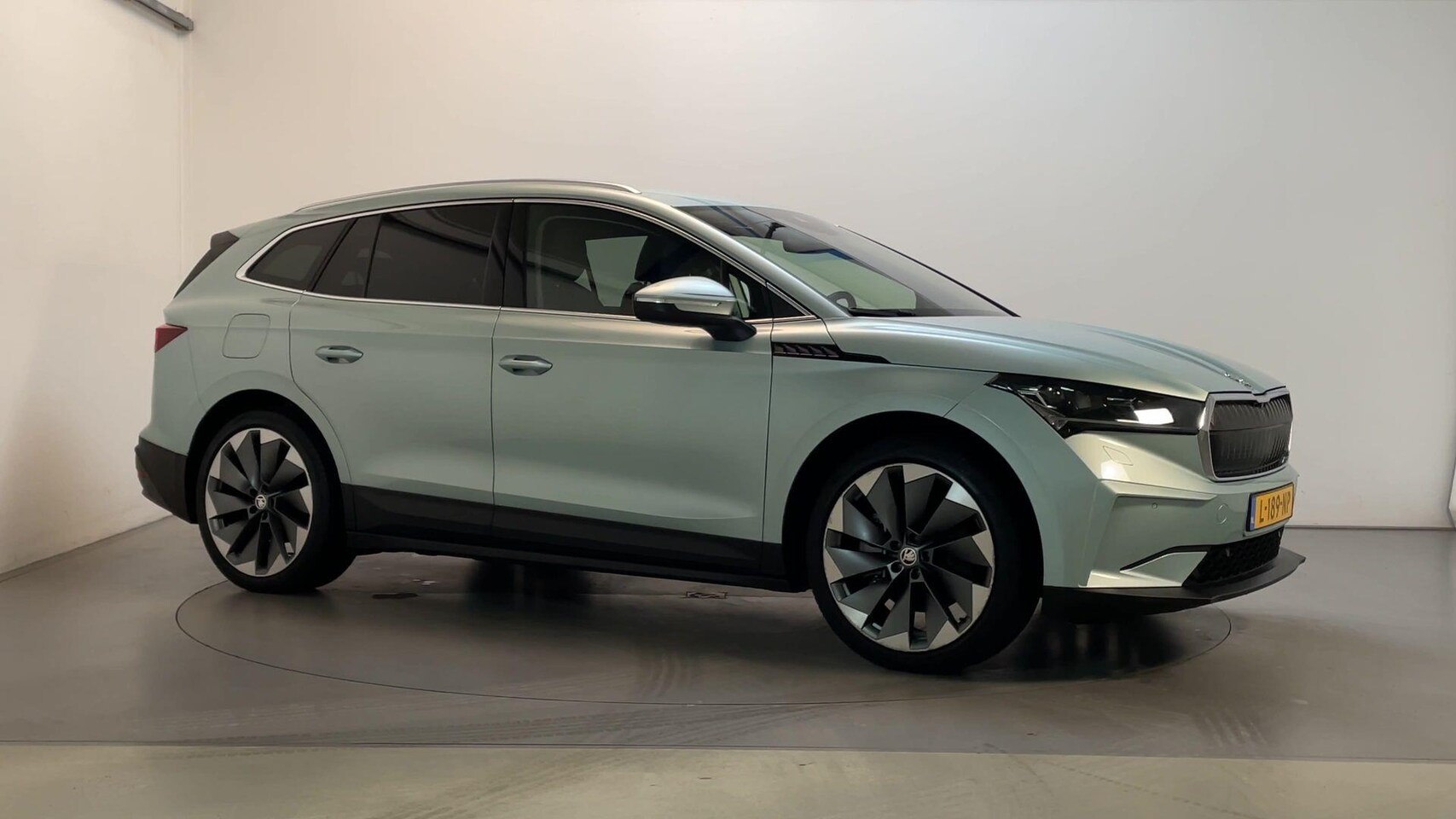 Skoda Enyaq iV - 80 First Edition Leder LED Camera Stoelverwarming Sfeerverlichting - AutoWereld.nl