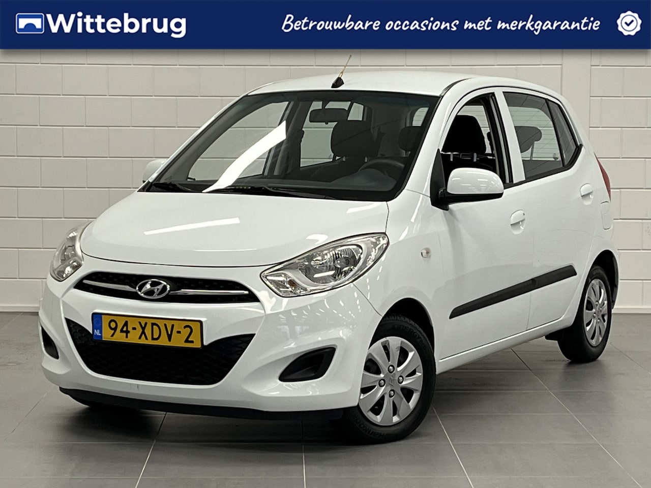 Hyundai i10 - 1.1 i-Drive Cool AIRCO | RADIO / CD | ELEKTRISCHE RAMEN | 12 MAANDEN GARANTIE! - AutoWereld.nl