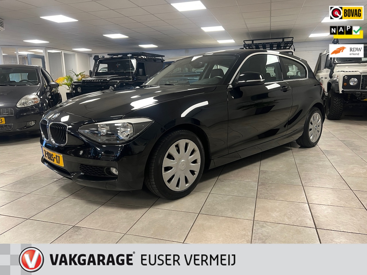 BMW 1-serie - 116i Business Lederen bekleding, Airco, Cruise controle, Parkeersensoren. - AutoWereld.nl