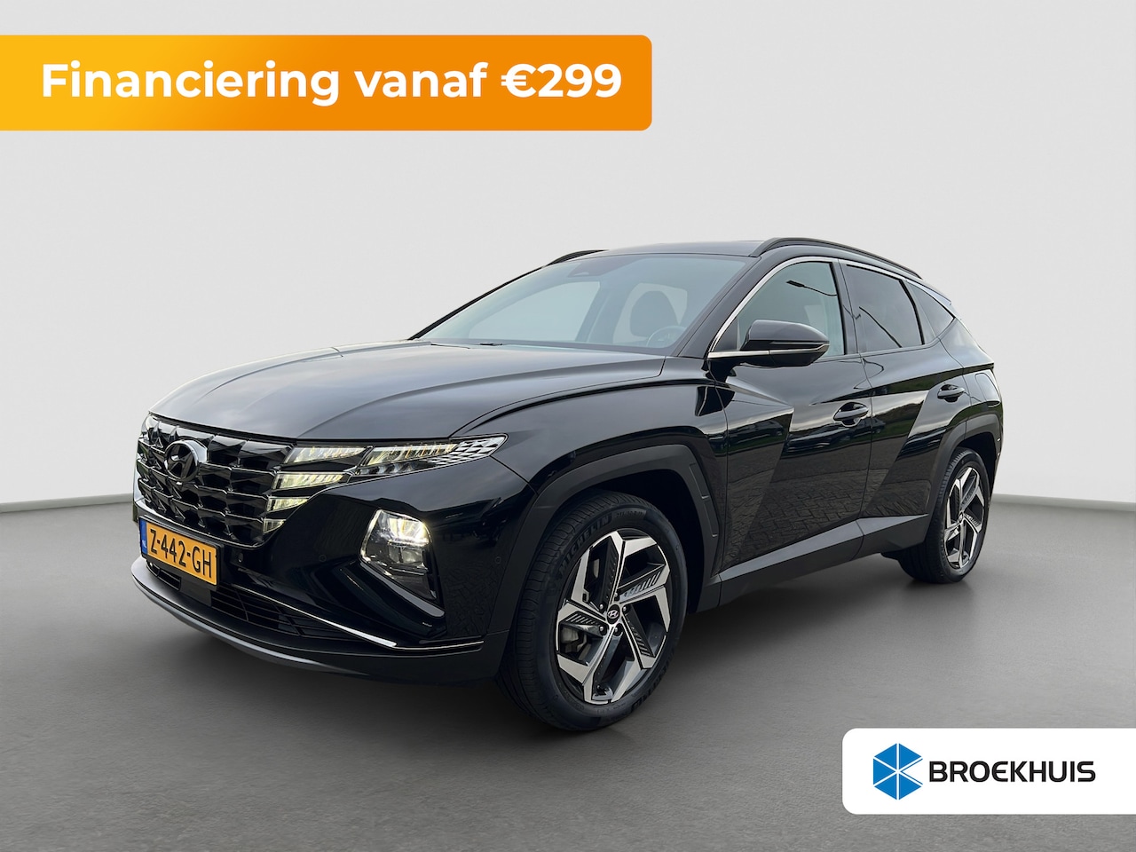 Hyundai Tucson - 1.6 T-GDI 265pk PHEV Premium 4WD (299,- p/m Demo Deal!) | Leder | Carplay | Climate | Keyl - AutoWereld.nl