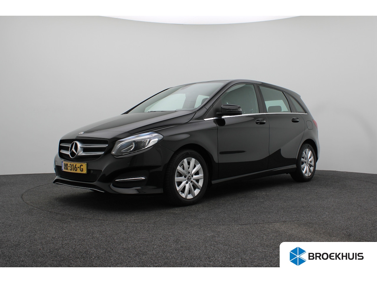 Mercedes-Benz B-klasse - 180 Ambition Automaat | Achterbank in delen neerklapbaar | Airco | Bagagedek - AutoWereld.nl
