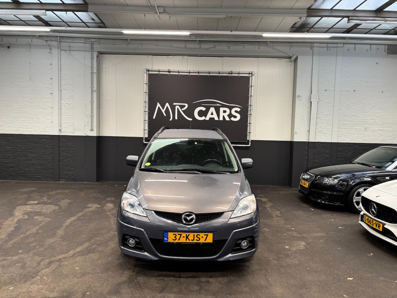 Mazda 5 - 2.0 Business 7.p Navi/Airco/Cruise Control - AutoWereld.nl