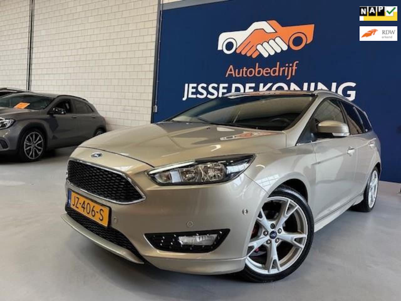 Ford Focus Wagon - 1.0 Titanium / bj.2016 / champagne / camera/ navigatie / sportvelgen / climate / APK 01/20 - AutoWereld.nl
