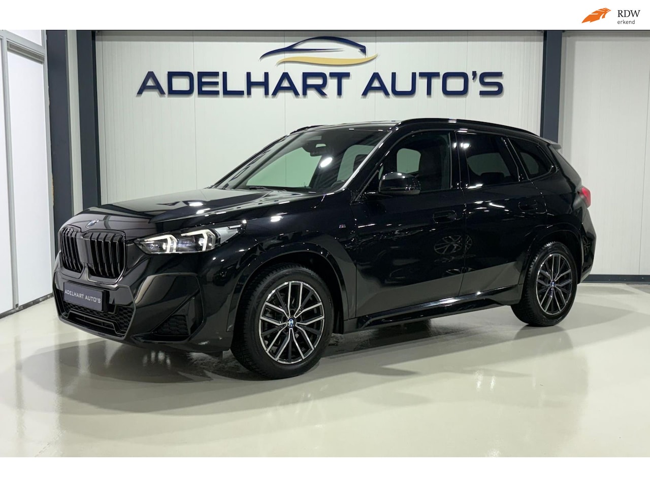 BMW X1 - SDrive18i M Sport / Wide Screen Navigatie full map / Lederen interieur / Elektrische Stoel - AutoWereld.nl