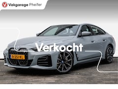 BMW i4 - eDrive40 84 kWh SOH 92% M-Sport/ Sportstoelen/ Elek. trekhaak/ Camera/ Sfeerverlichting/ E