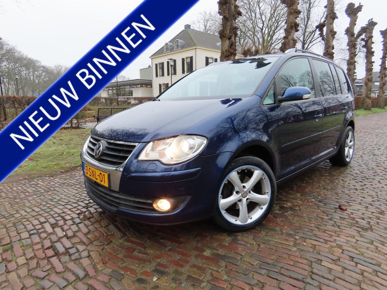 Volkswagen Touran - 1.4 TSI Comfortline Business 7 Persoons Ecc Cruisecontrol Stoelverwarming Xenon Pdc Lm Vel - AutoWereld.nl