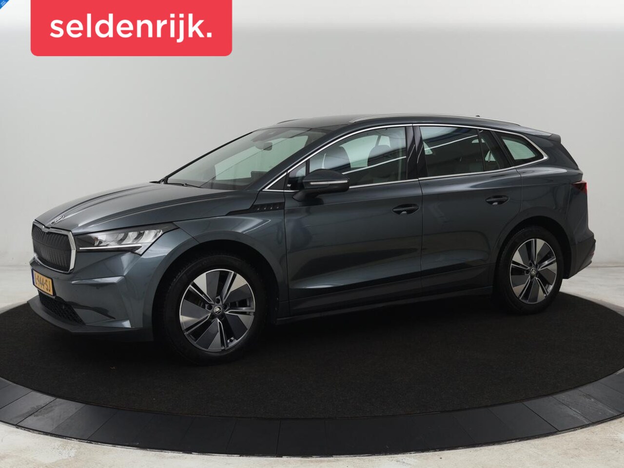 Skoda Enyaq iV - 60 | 68.900km NAP | Sfeerverlichting | Carplay | Half leder | Navigatie | Full LED | Chroo - AutoWereld.nl