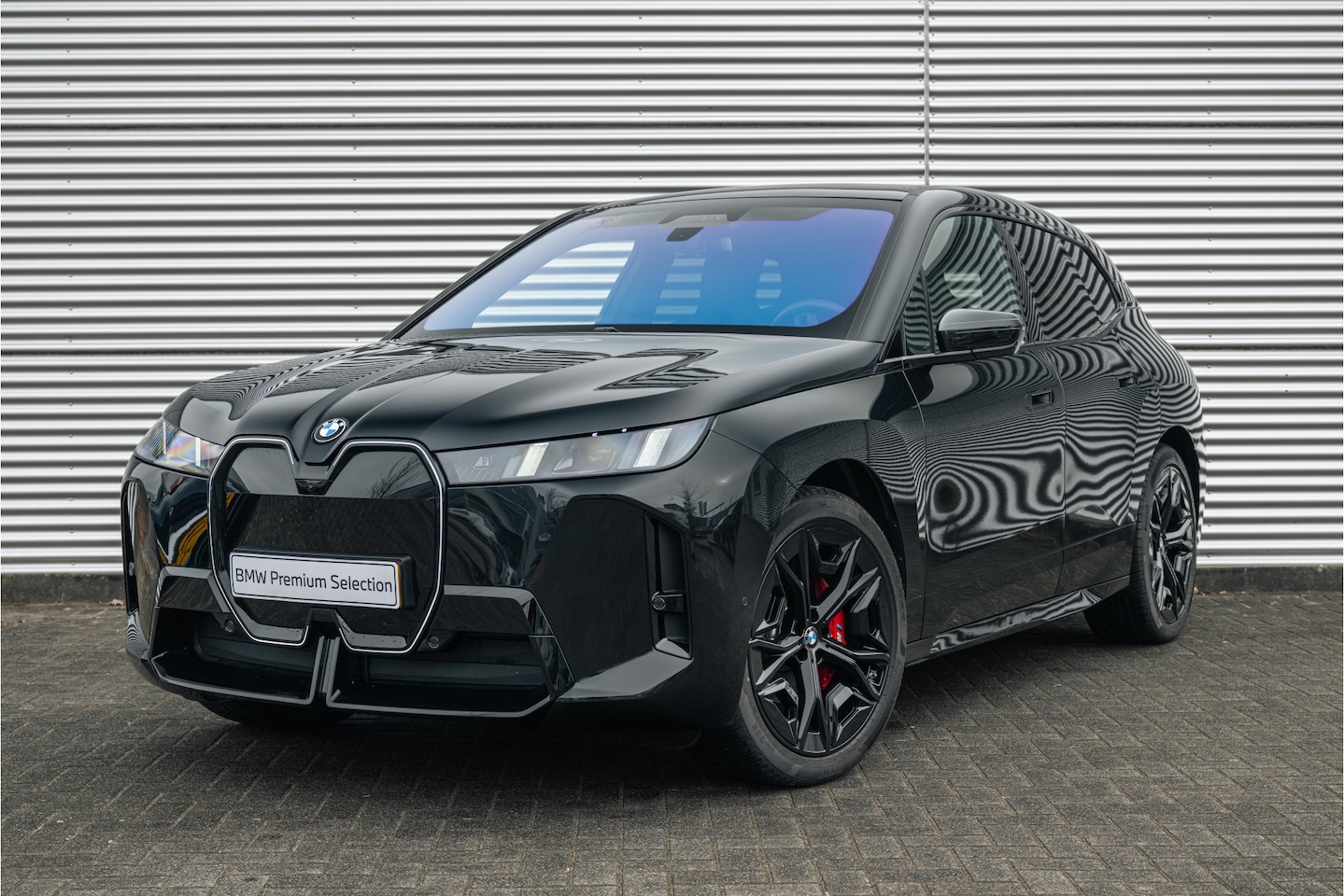 BMW iX - xDrive60 M Sport / Panoramadak Sky Lounge / Trekhaak / M Multifunctionele Stoelen / Parkin - AutoWereld.nl