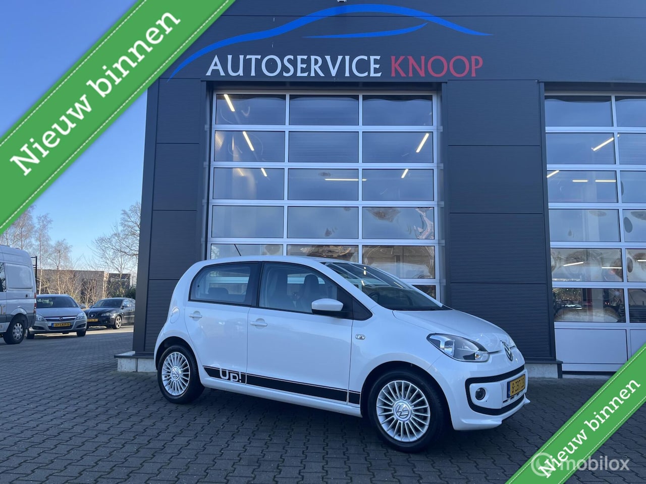 Volkswagen Up! - 1.0 high up! BlueMotion met all season banden - AutoWereld.nl