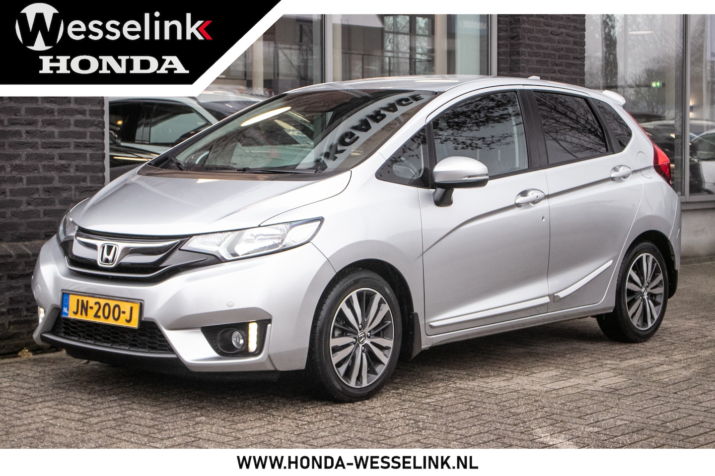 Honda Jazz - 1.3 i-VTEC Elegance | trekhaak | navi - AutoWereld.nl