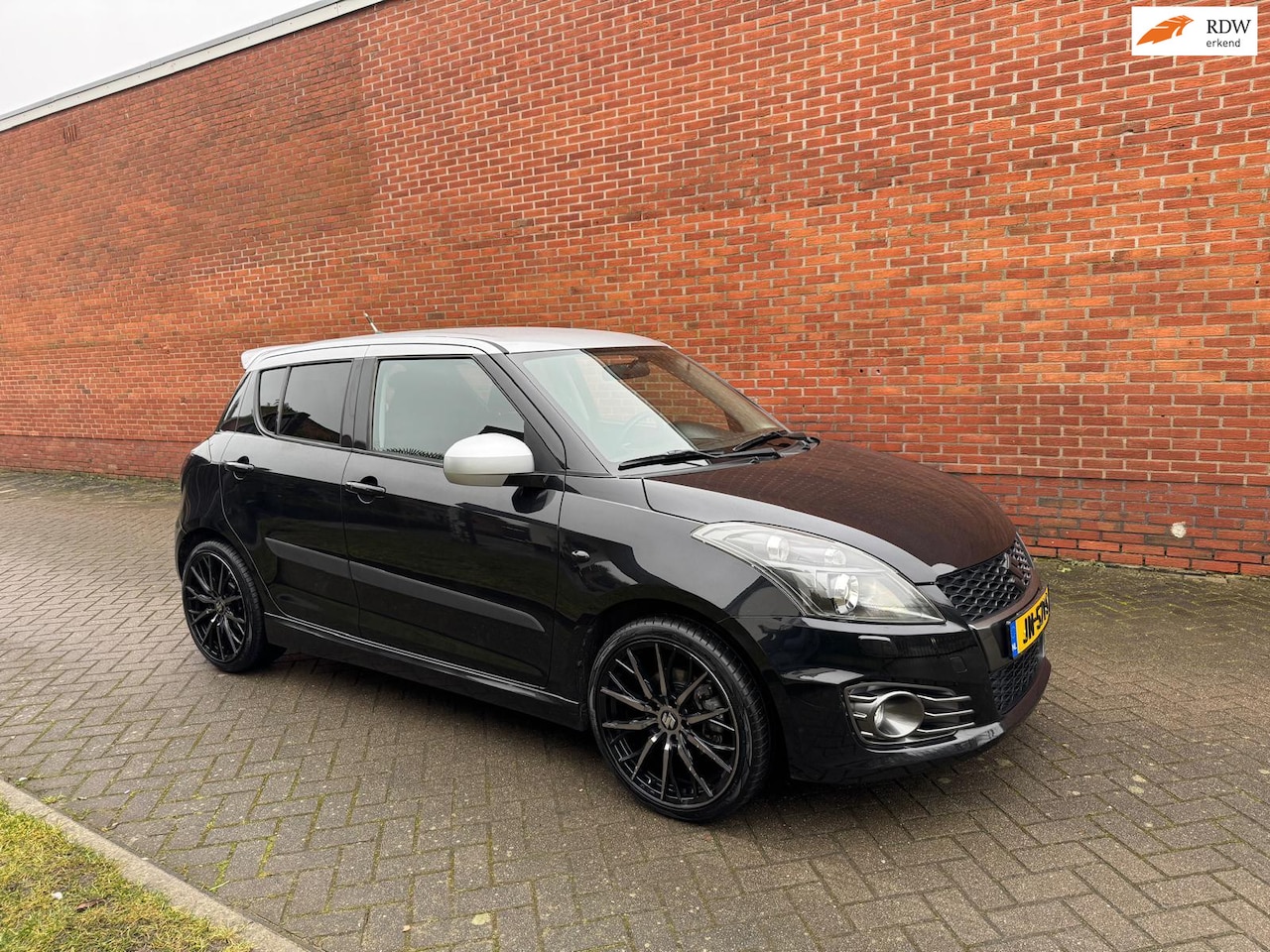 Suzuki Swift - 1.6 Sport Clima Xenon Cruise Stoelverw - AutoWereld.nl