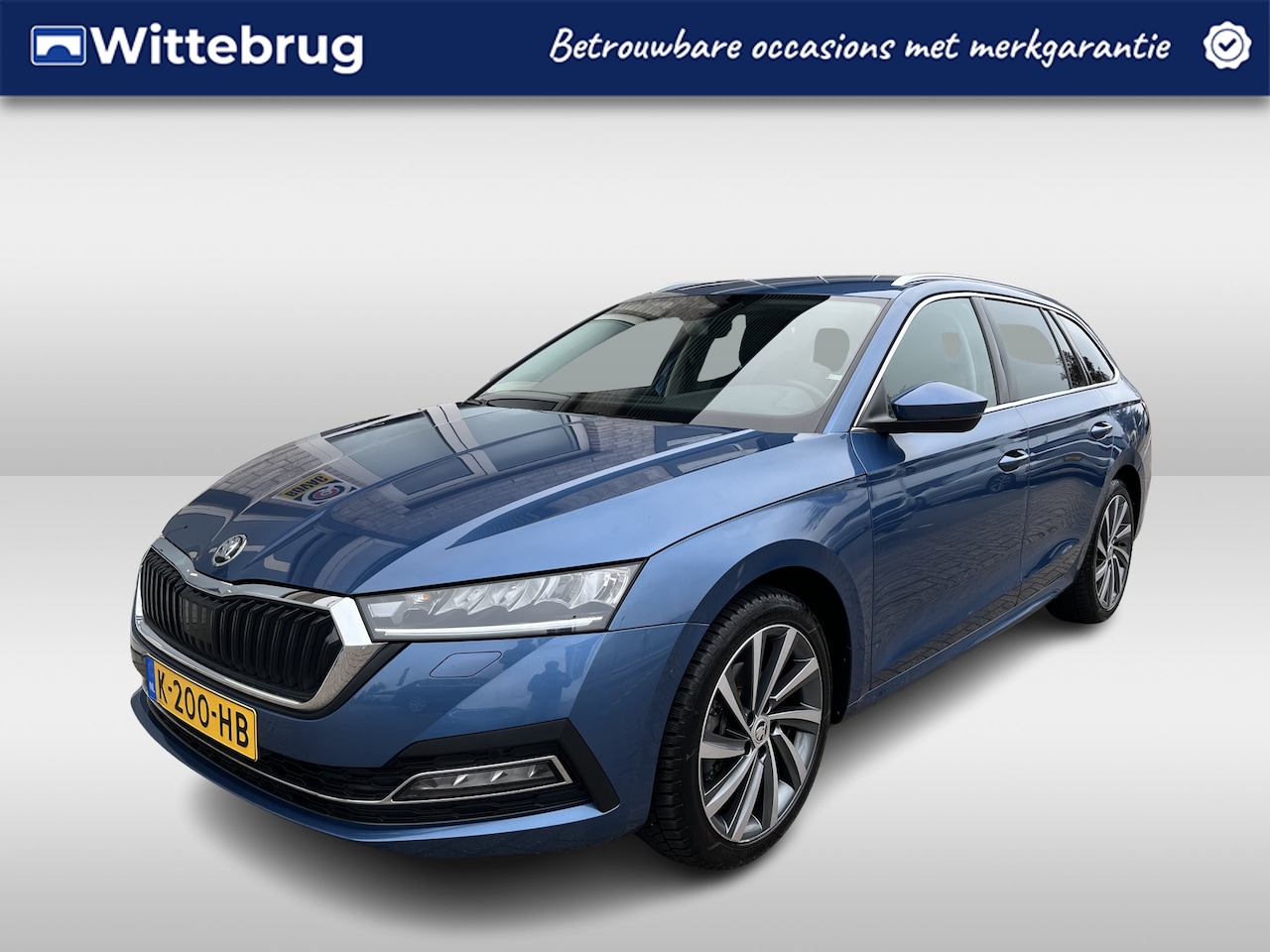Skoda Octavia Combi - 1.0 TSI Business Edition Plus / LEDER/ PARK. SENSOREN/ NAVI/ DIGITAL DASH/ STOELVERWARMING - AutoWereld.nl