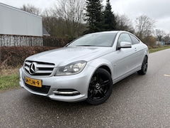 Mercedes-Benz C-klasse Coupé - 180 / AUTOMAAT / LEER / NAVI / CRUISE