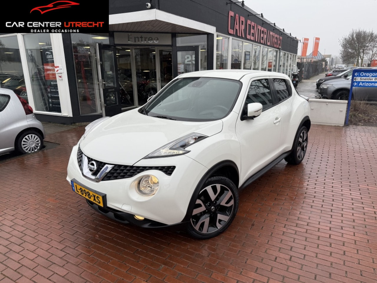 Nissan Juke - 1.2 DIG-T S/S Tekna navi airco 6versellingen - AutoWereld.nl
