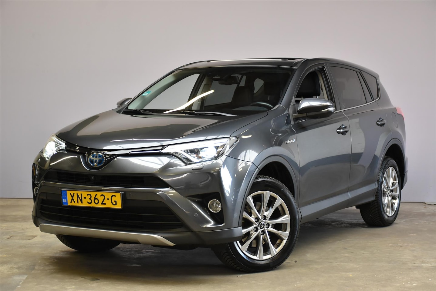 Toyota RAV4 - 2.5i Hybrid AWD Aut Executive Business I Leder. - AutoWereld.nl