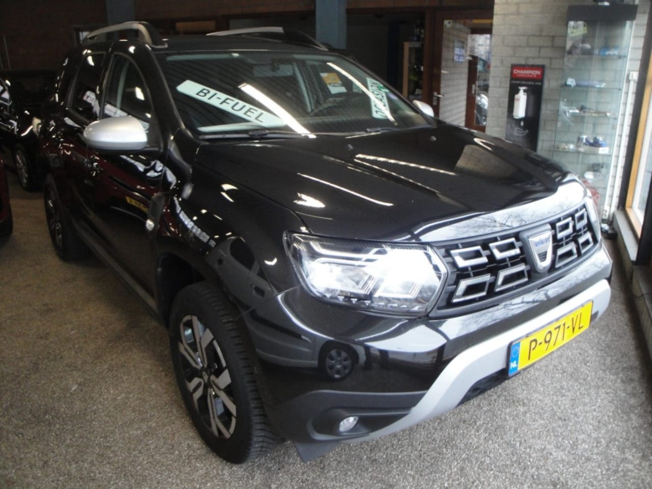 Dacia Duster - 1.0 TCe Bi- Fuel Prestige (1e Eig.) Audio/Navi en A.-Cam., Cr.- en ClimateControle, Leder, - AutoWereld.nl