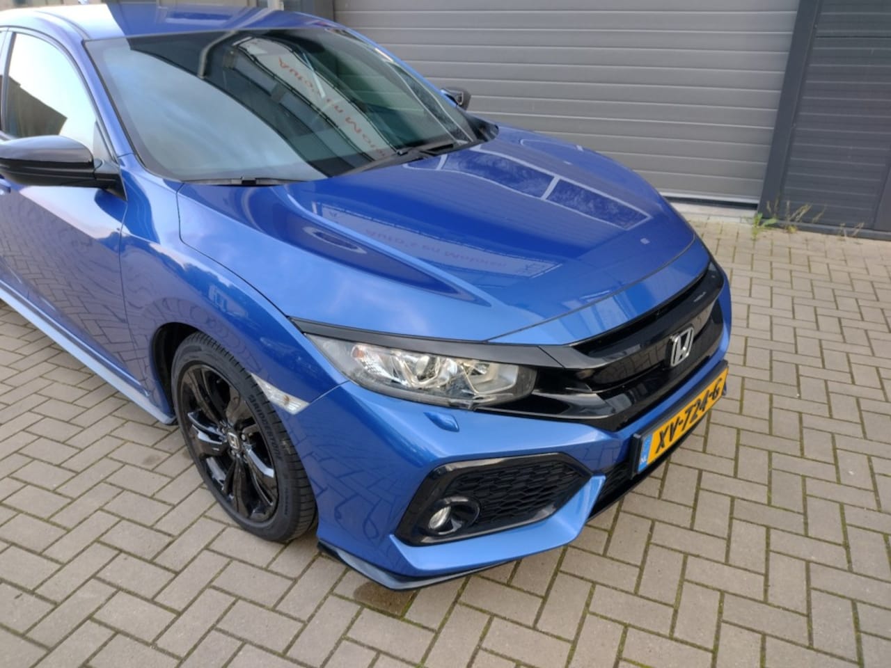 Honda Civic - 5 drs 1.0i-Vtec Aut. Black Edition - AutoWereld.nl
