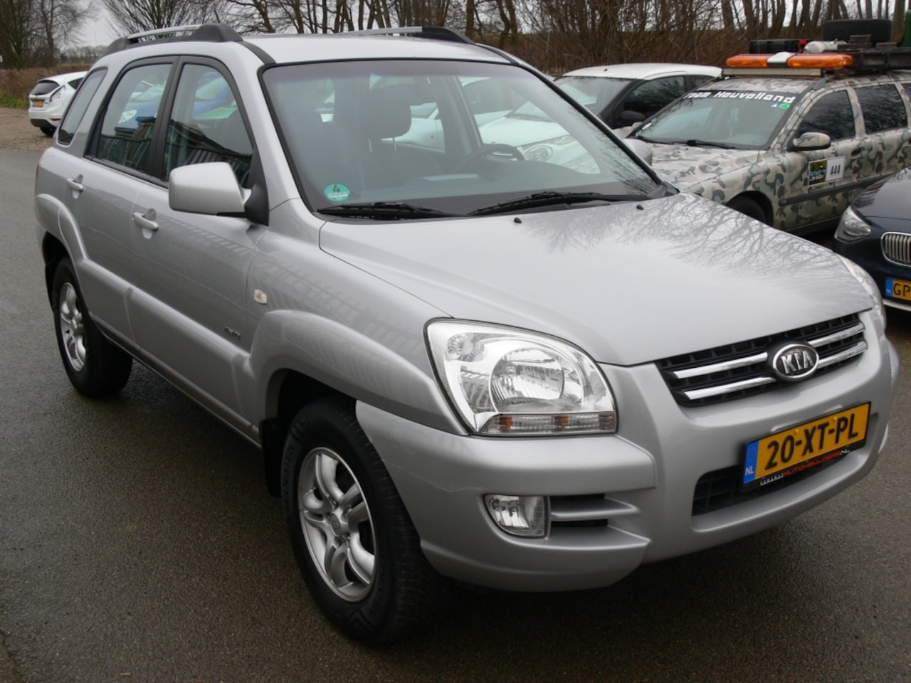 Kia Sportage - 2.0 CVVT X-treme 4WD 2.0 CVVT X-treme 4WD - AutoWereld.nl