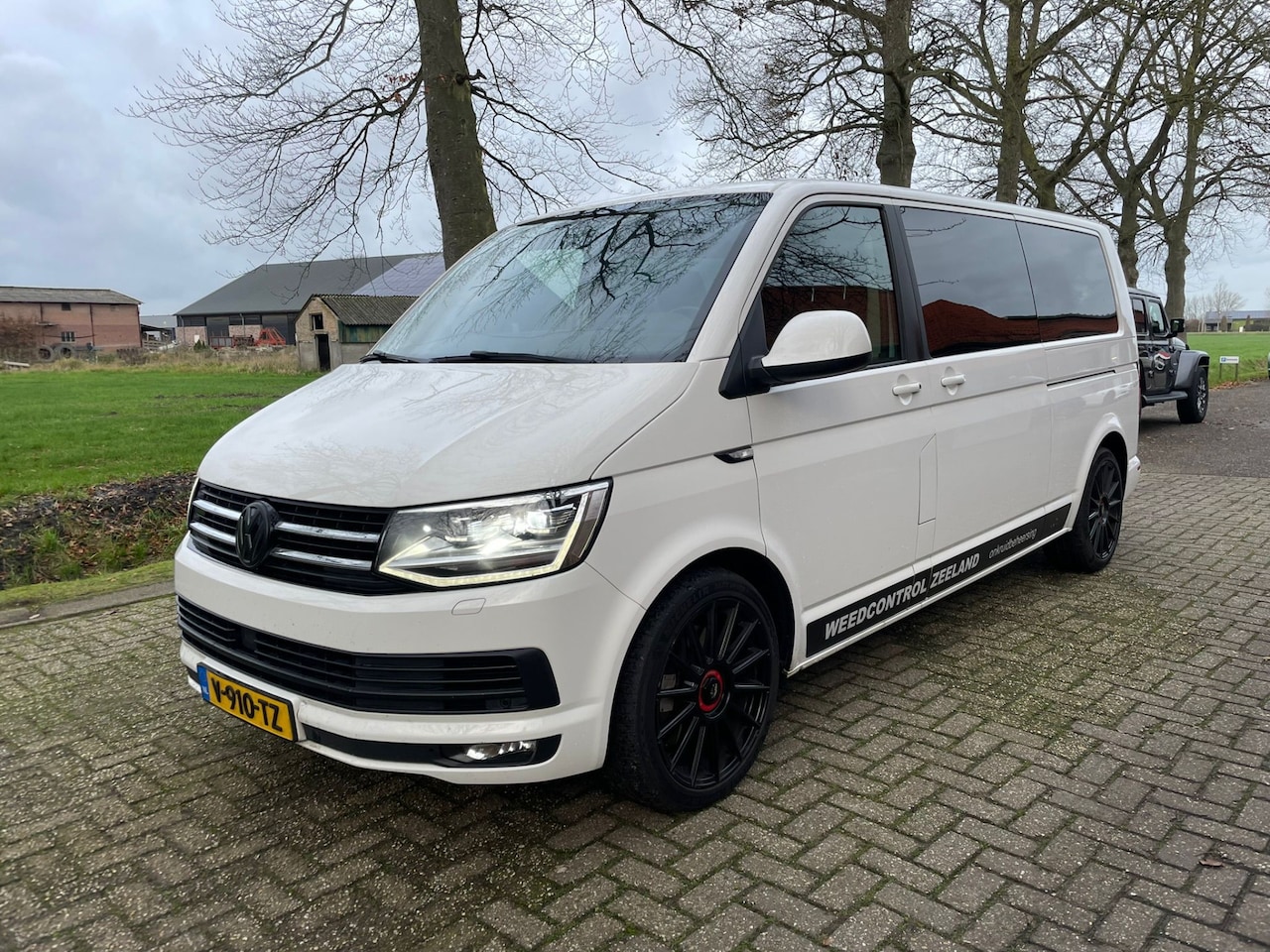 Volkswagen Transporter - 2.0 TDI 204PK L2H1 DC 4Motion Highline 2 x Schuifdeur Leder Standverwarming - AutoWereld.nl