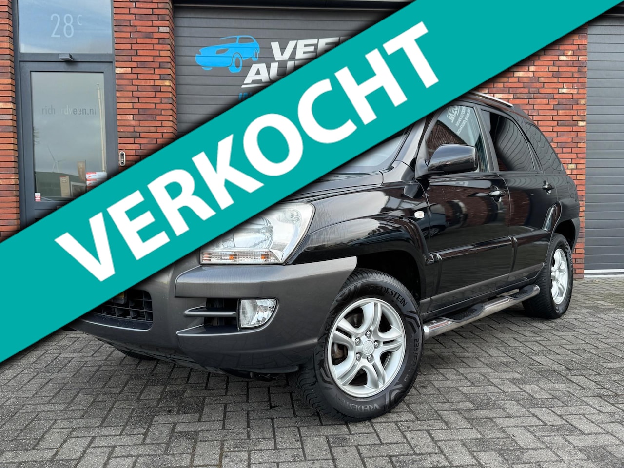 Kia Sportage - 2.0 CVVT X-ecutive Trekhaak Cruise Clima Nieuwe APK - AutoWereld.nl