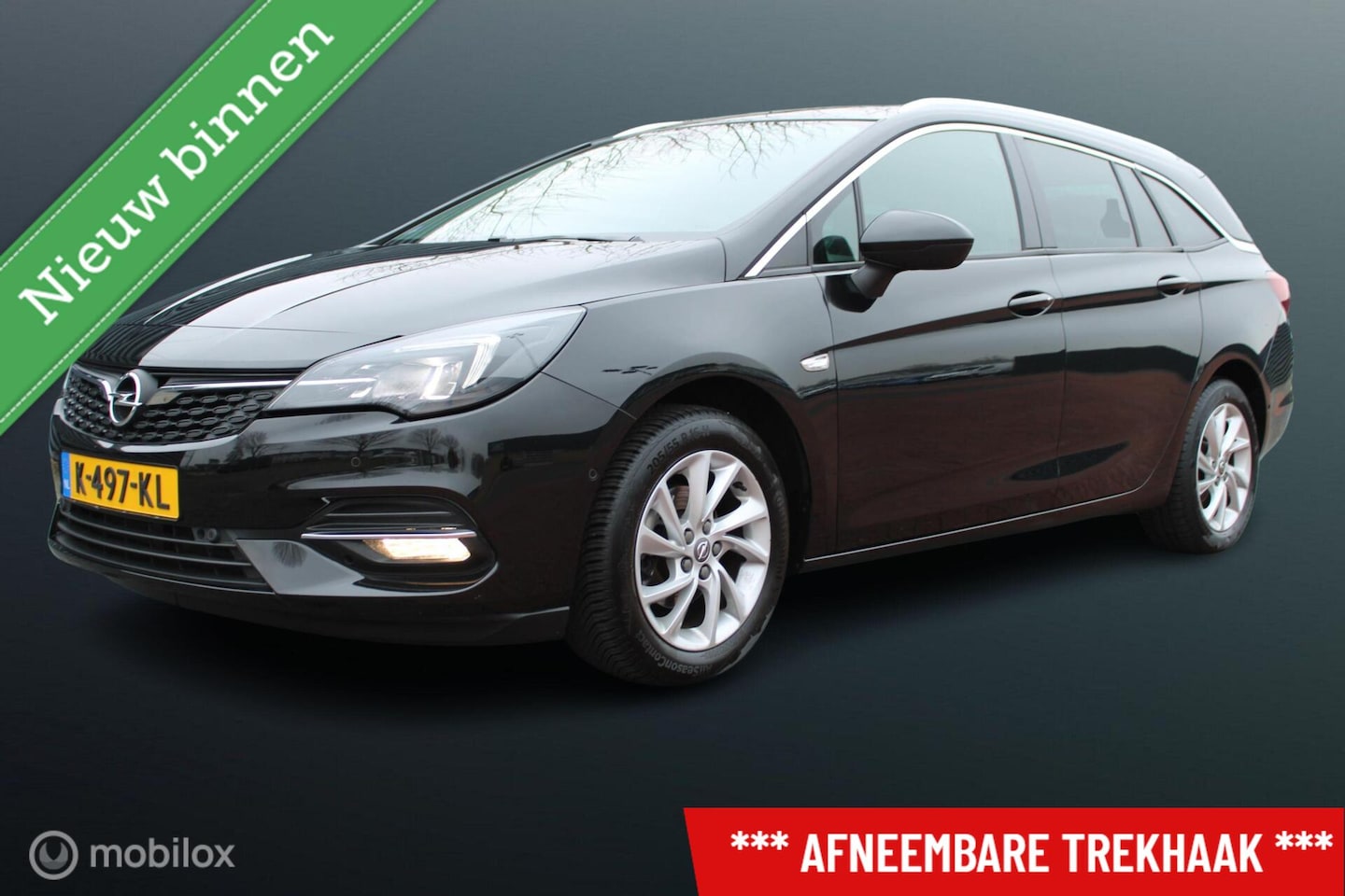 Opel Astra Sports Tourer - 1.2 Turbo 130 PK Business Elegance, Trekhaak, Navi, Pdc voor + achter + camera, Donker gla - AutoWereld.nl