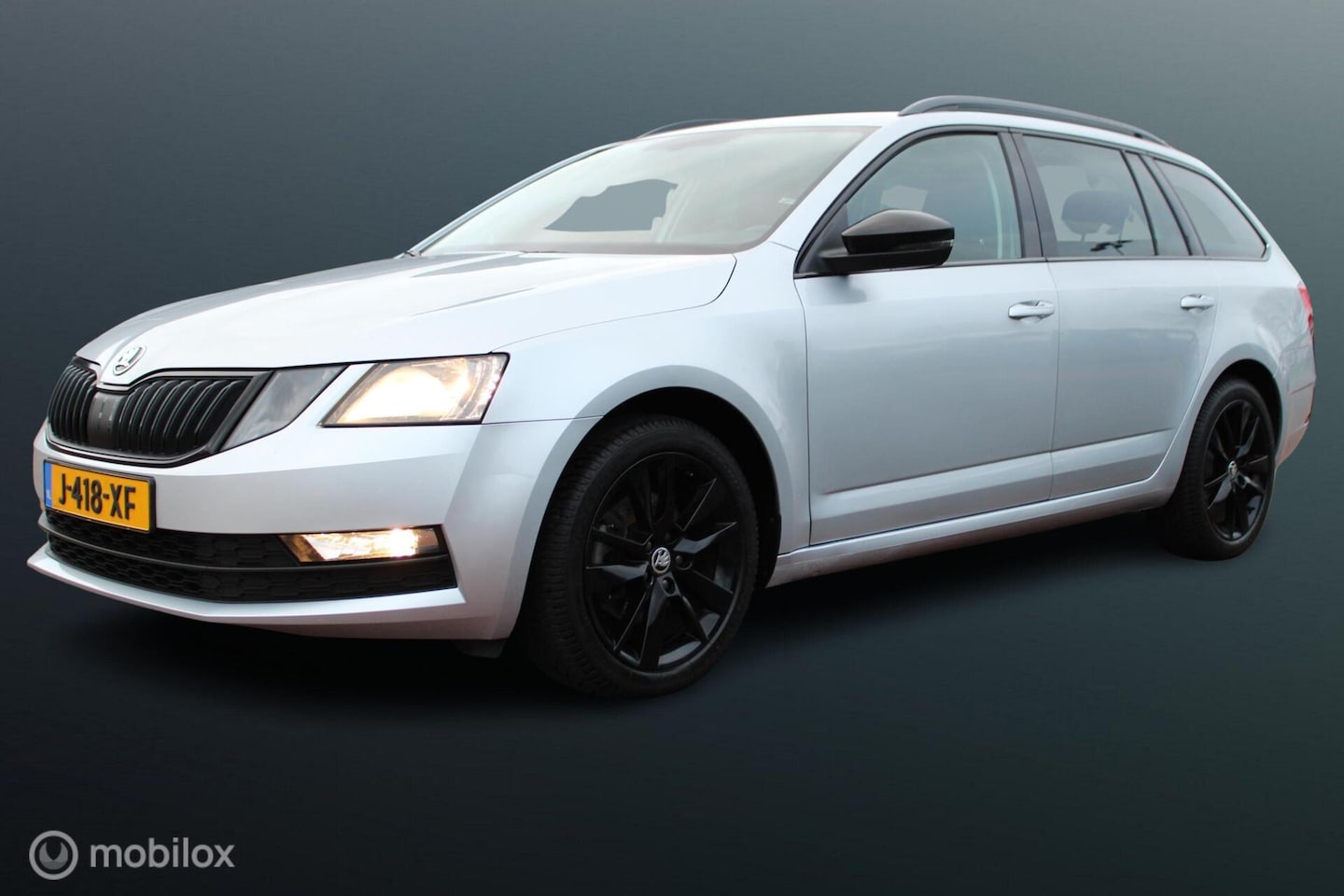 Skoda Octavia Combi - 1.0 TSI Greentech Business Edition 1.0 TSI Greentech Business Edition, Stoelverwarming, Navi, App Connect, Pdc, Donker glas, - AutoWereld.nl