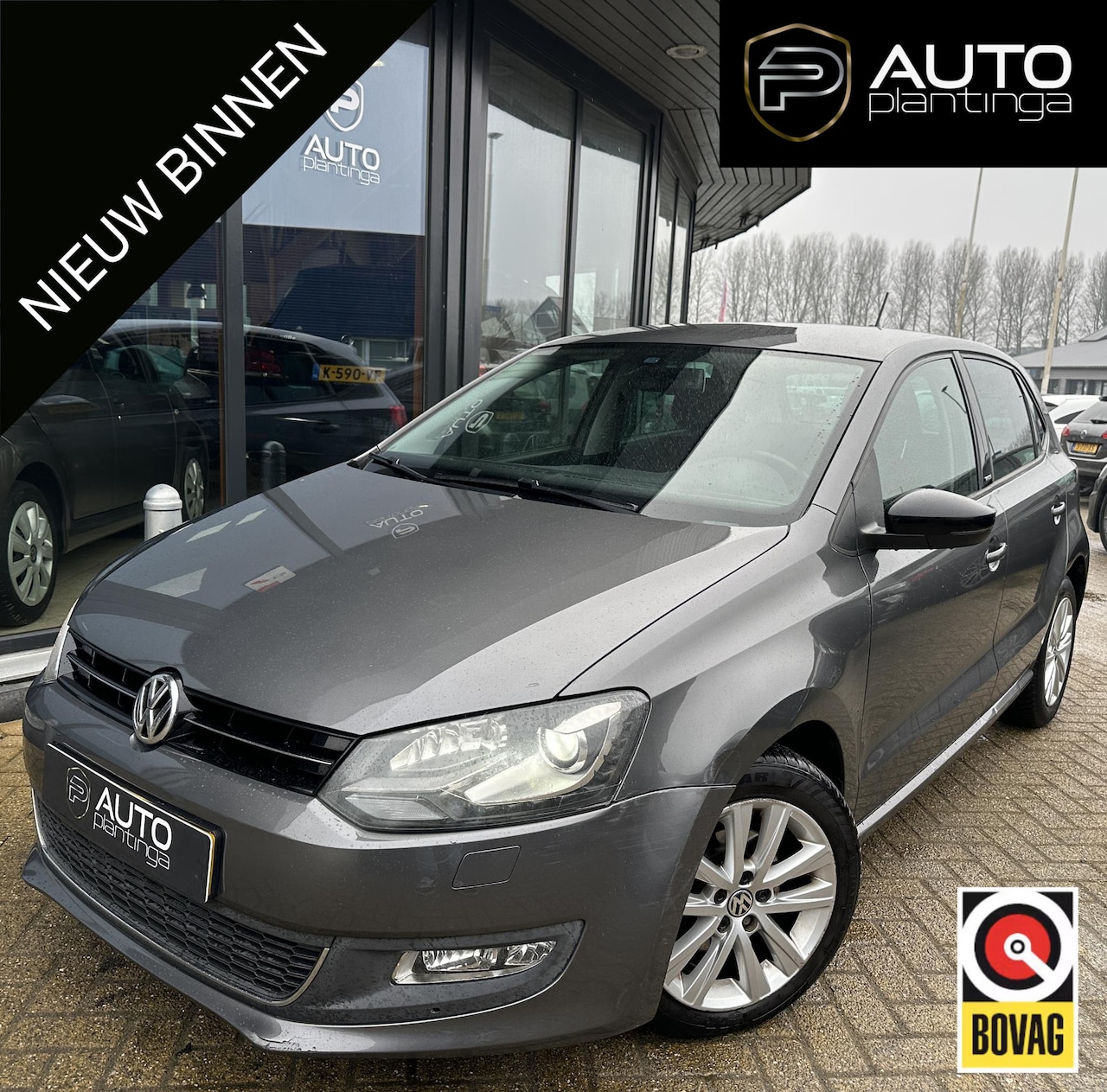 Volkswagen Polo - 1.2 TSI Comfortline | AUTOMAAT | Stoelverwarming | Climate Control | Navigatie | Parkeerse - AutoWereld.nl