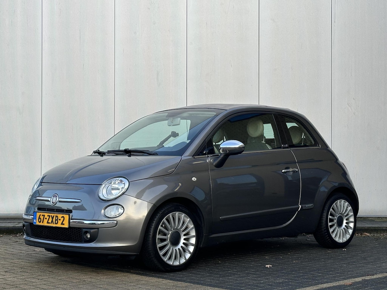 Fiat 500 - 0.9 TwinAir Cabrio by Gucci l Automaat l PDC l Interscope Sound l - AutoWereld.nl